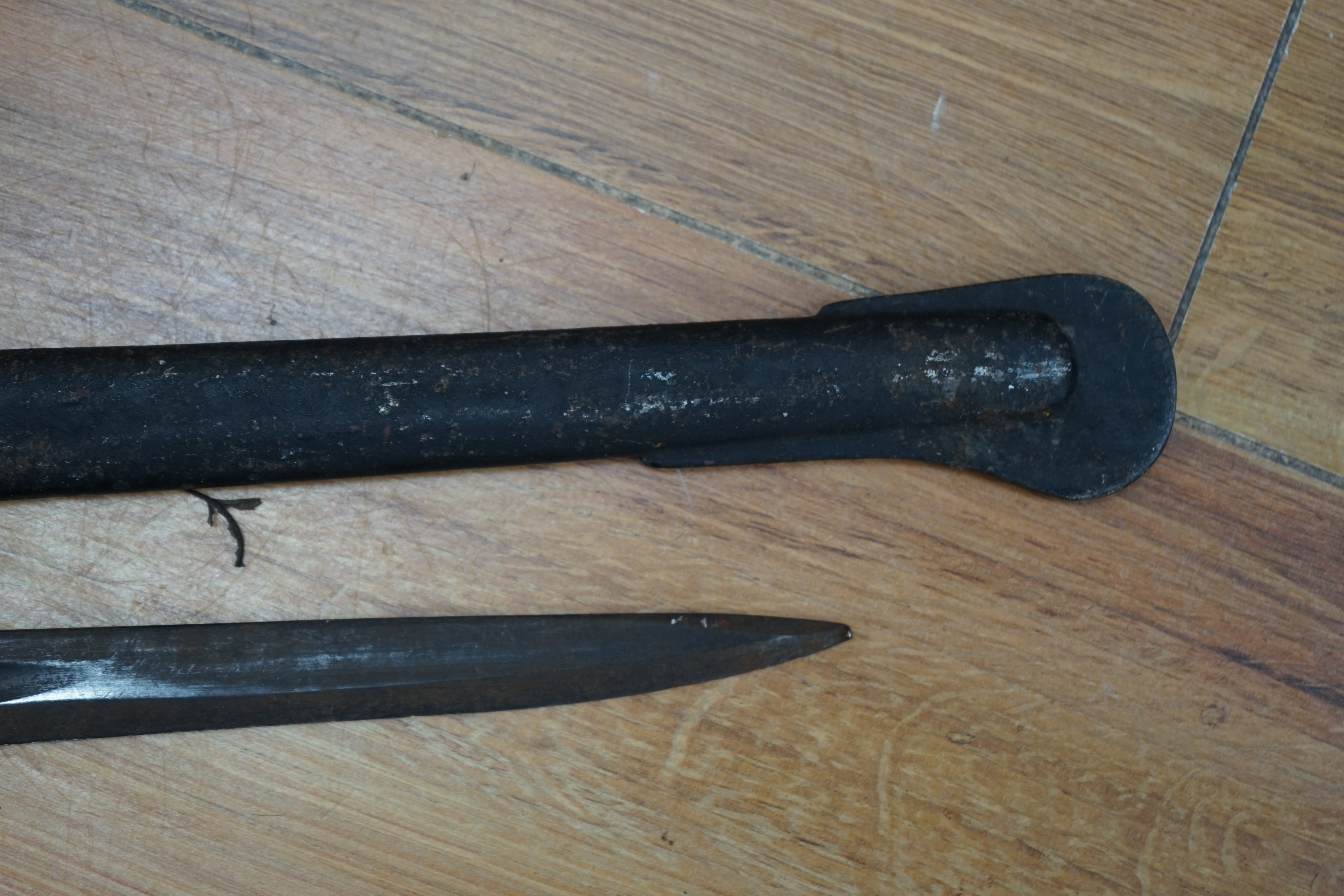 A Dutch East Indies short sword / kris having horn handle and gold inlay, another similar, a late 19th century sword and scabbard, an epee and another sword (5)